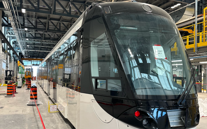 Hazel McCallion Line light rail vehicle in a maintenance building.