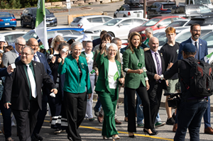The Lieutenant Governor of Ontario, Her Honour the Honourable Edith Dumont; the Honourable Nolan Quinn, Minister of Colleges and Universities, Excellence in Research and Security; and the Honourable Caroline Mulroney, Minister of Francophone Affairs and President of the Treasury Board, along with members of the community, march together in front of Laurentian University on the occasion of the fiftieth anniversary of the Franco-Ontarian flag.
